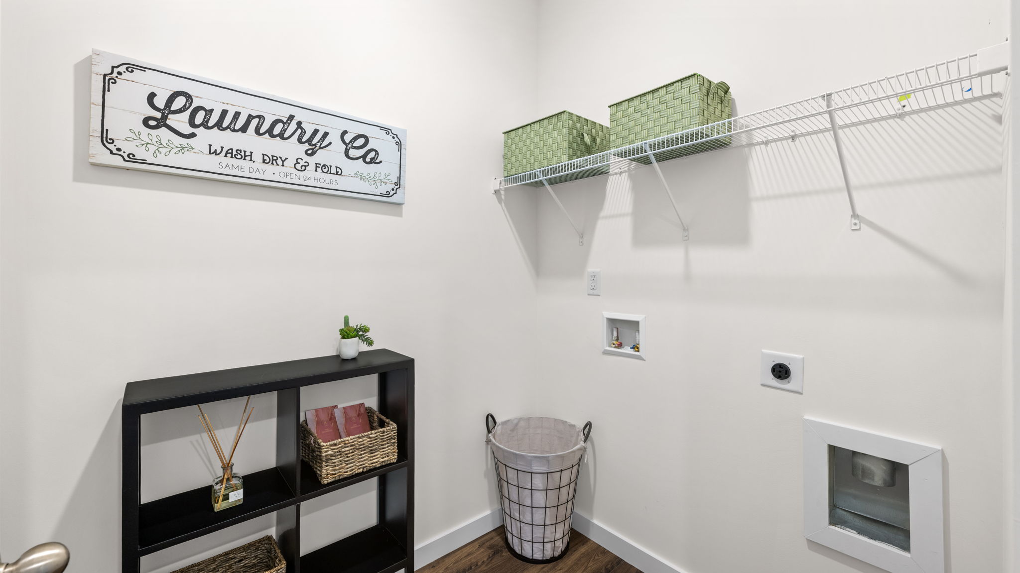 Laundry room with shelving
