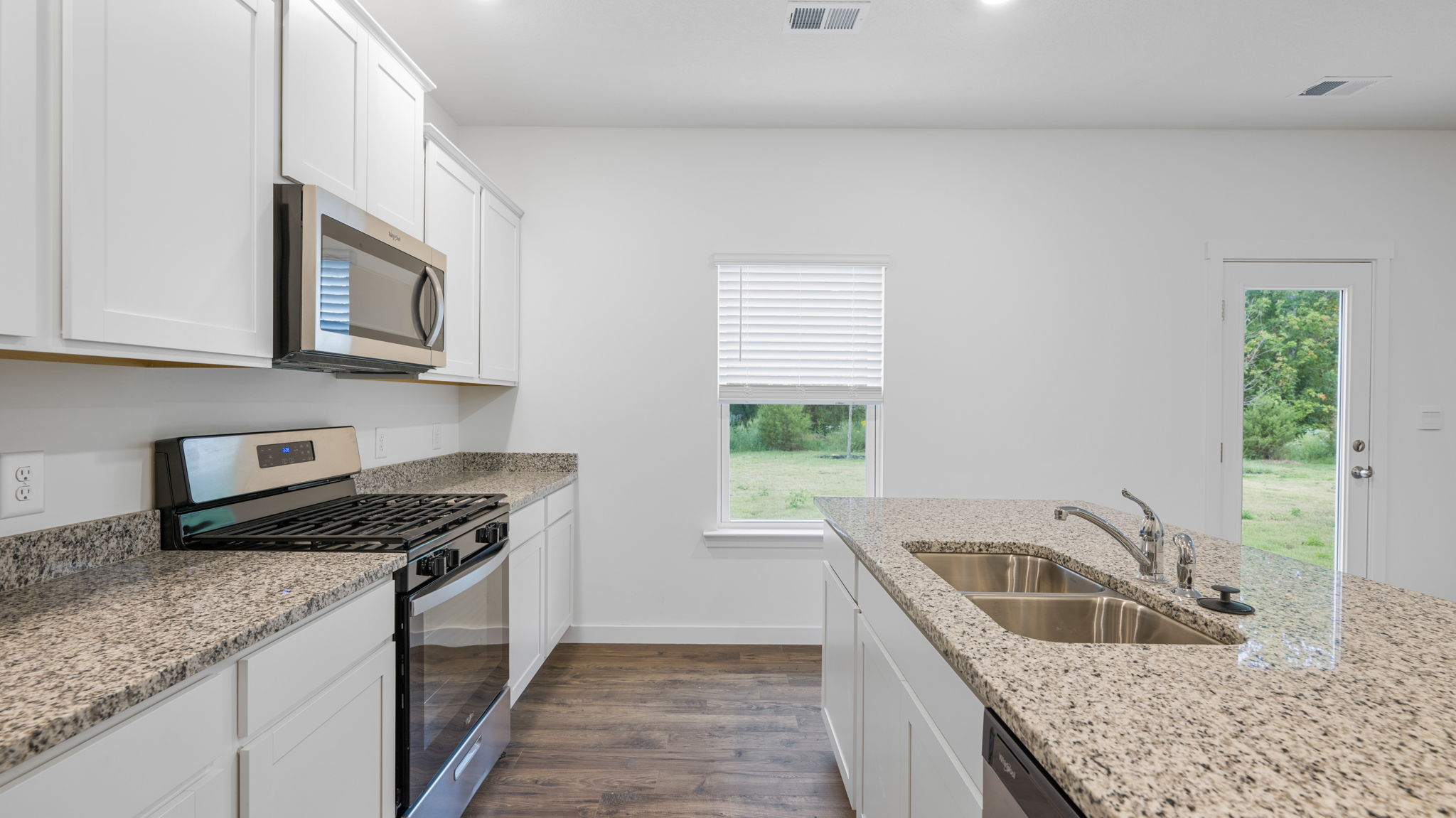kitchen with large island and stainless steel appliances