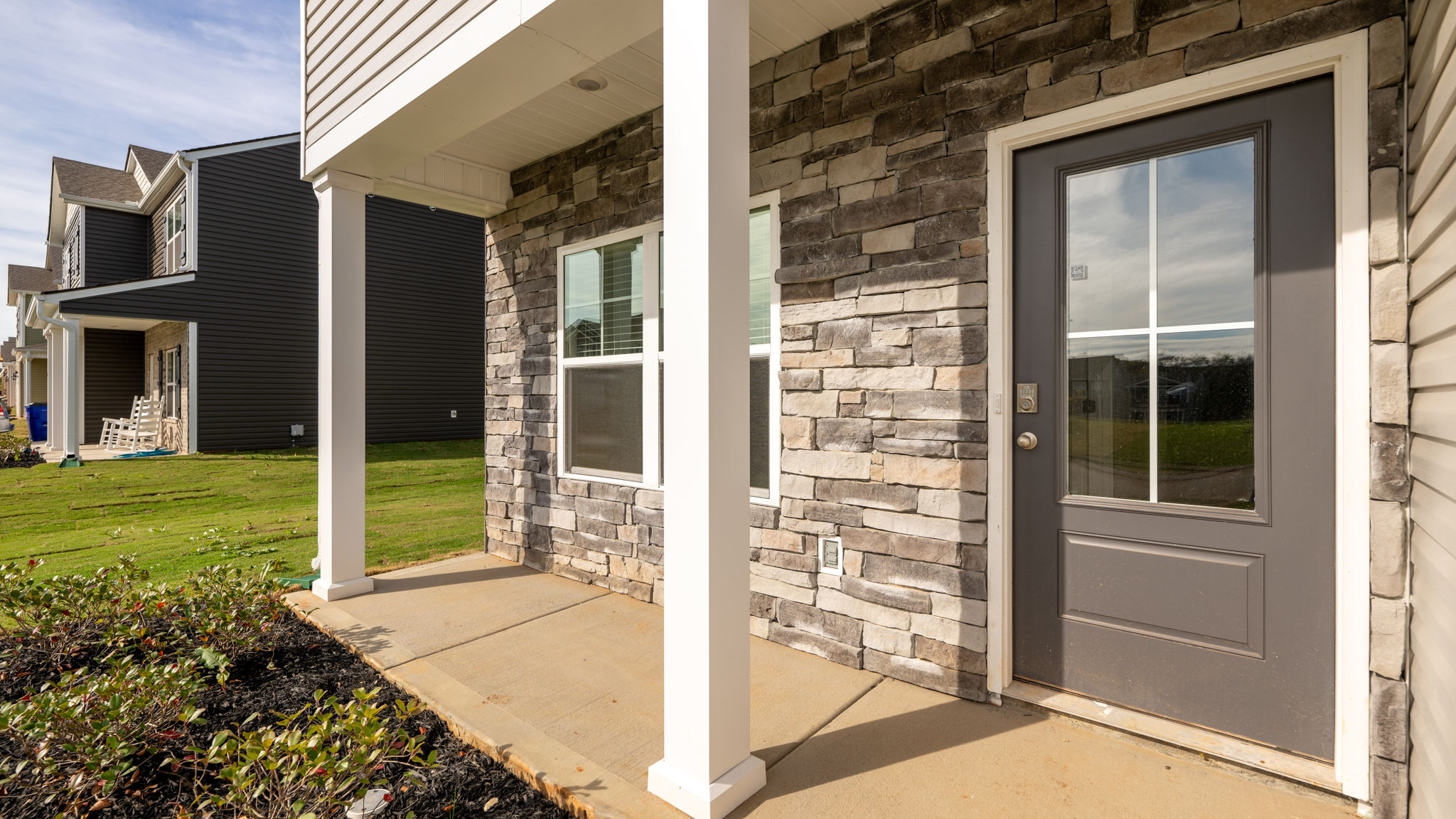 front porch of a two story home