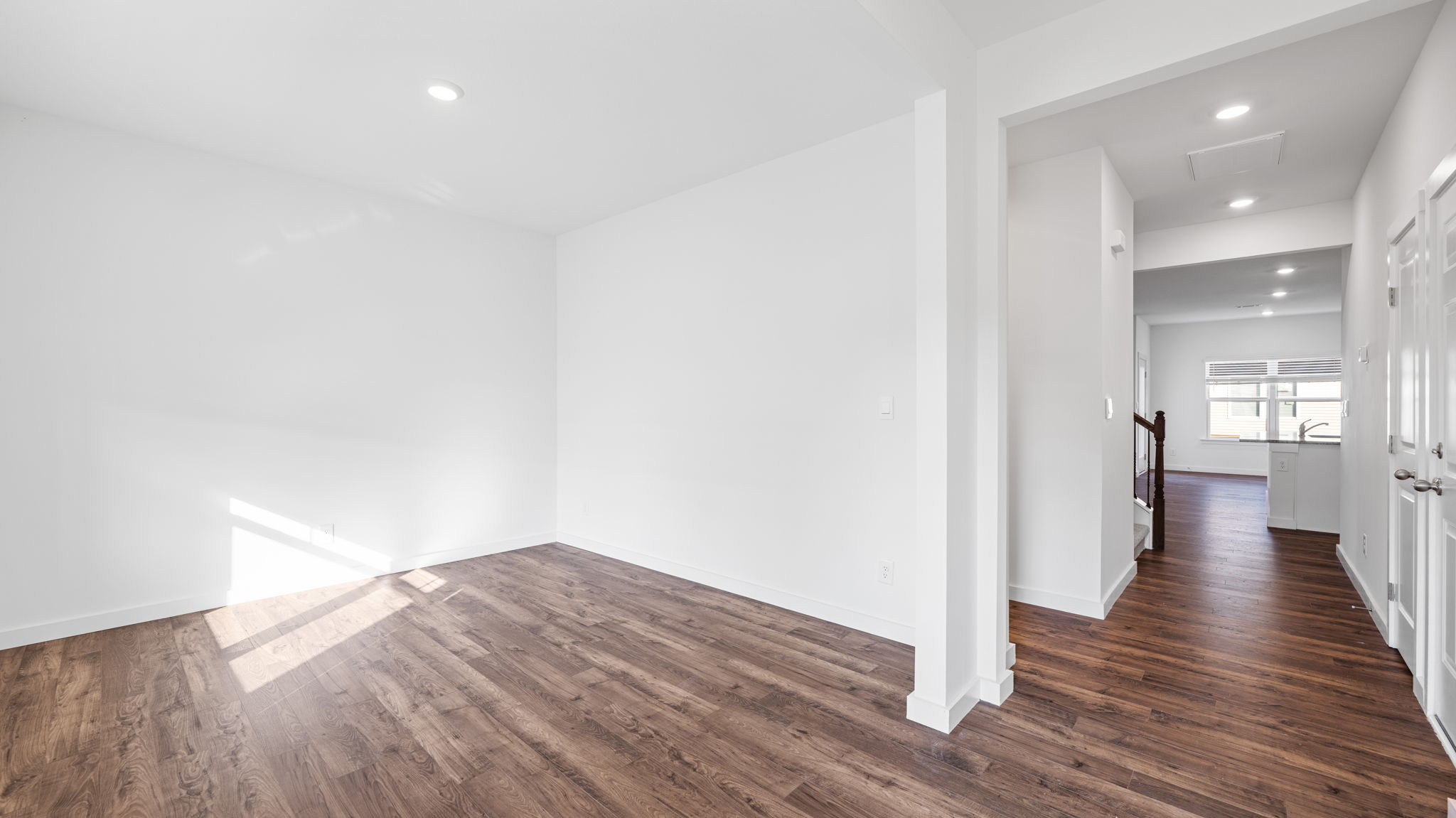 entryway with formal dining room to the left