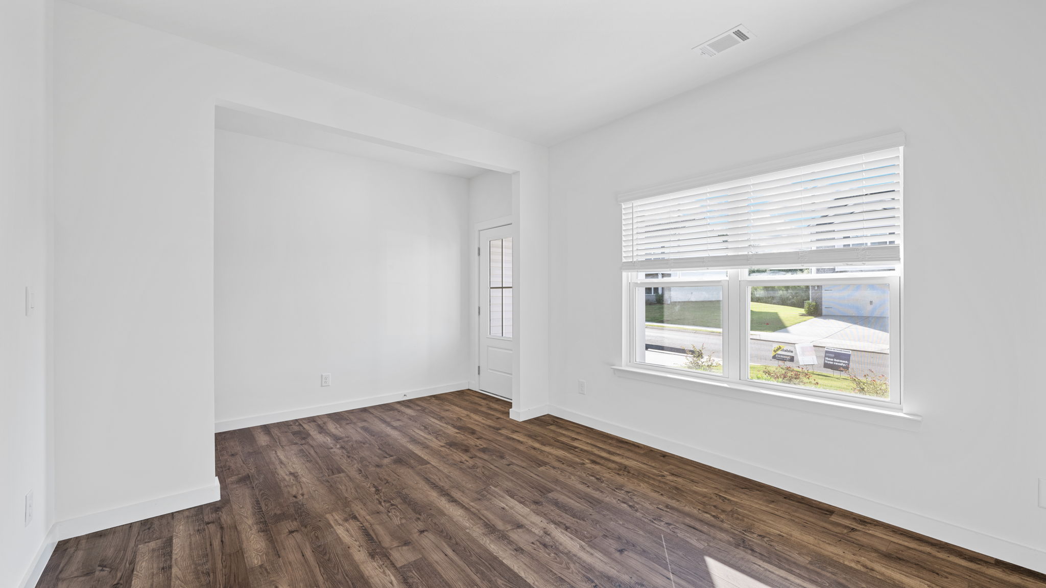 formal dining room with double window