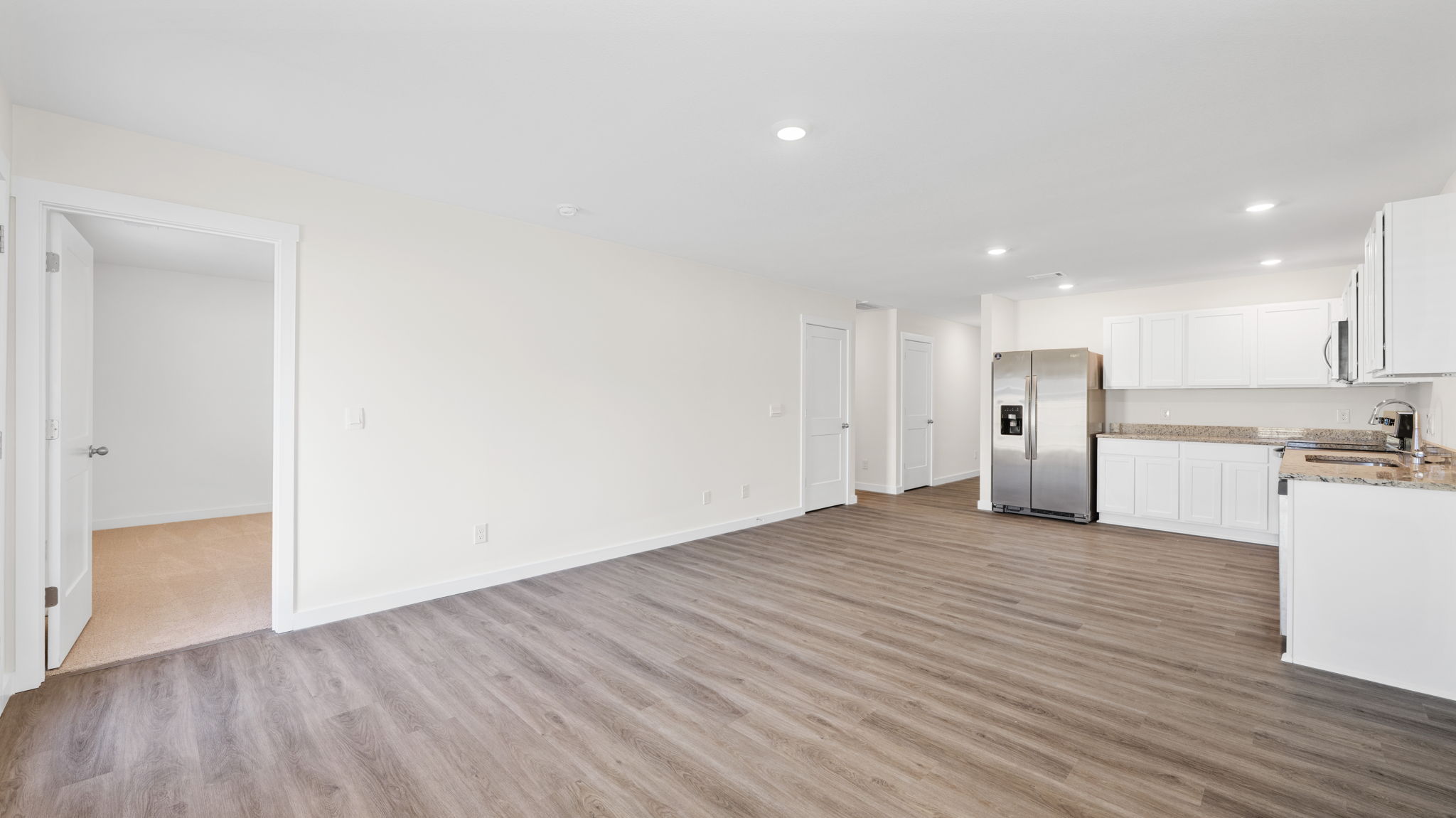 open concept living and kitchen area