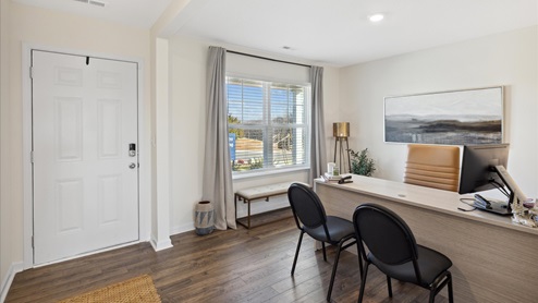 Dining area off entry way of home