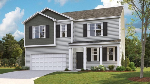 Two story home with two car garage and vinyl siding