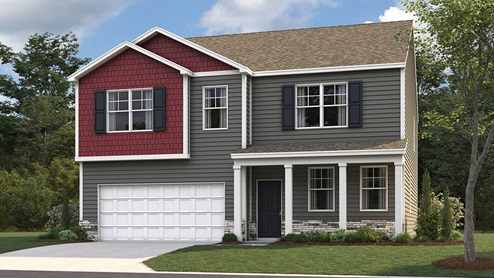 Two story home with two car garage and vinyl siding