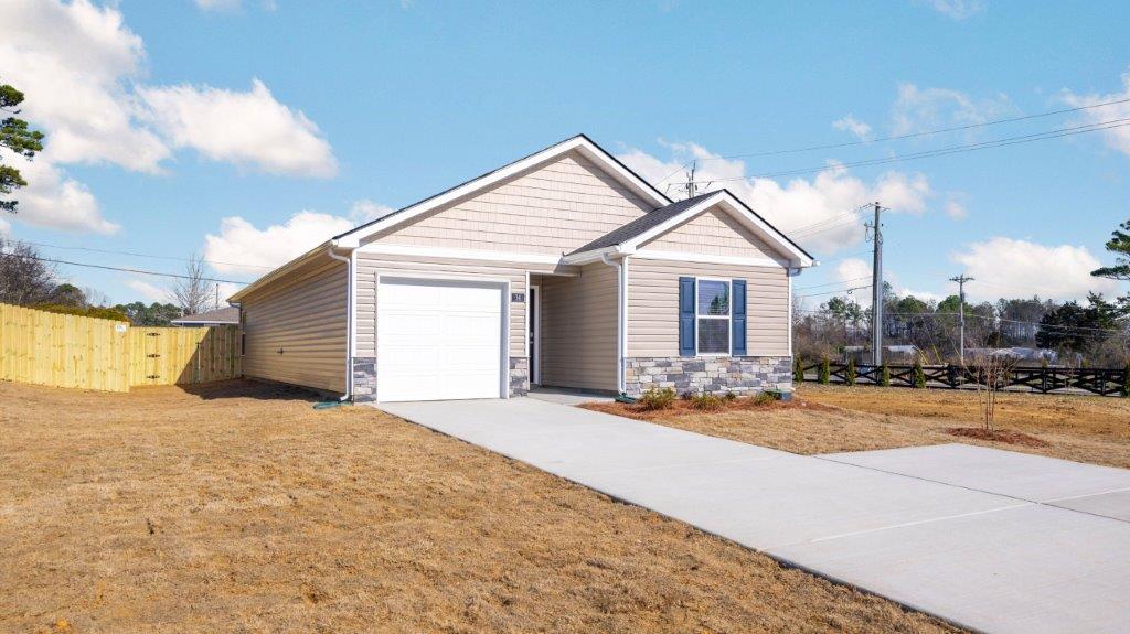 Exterior of one story home with single car garage
