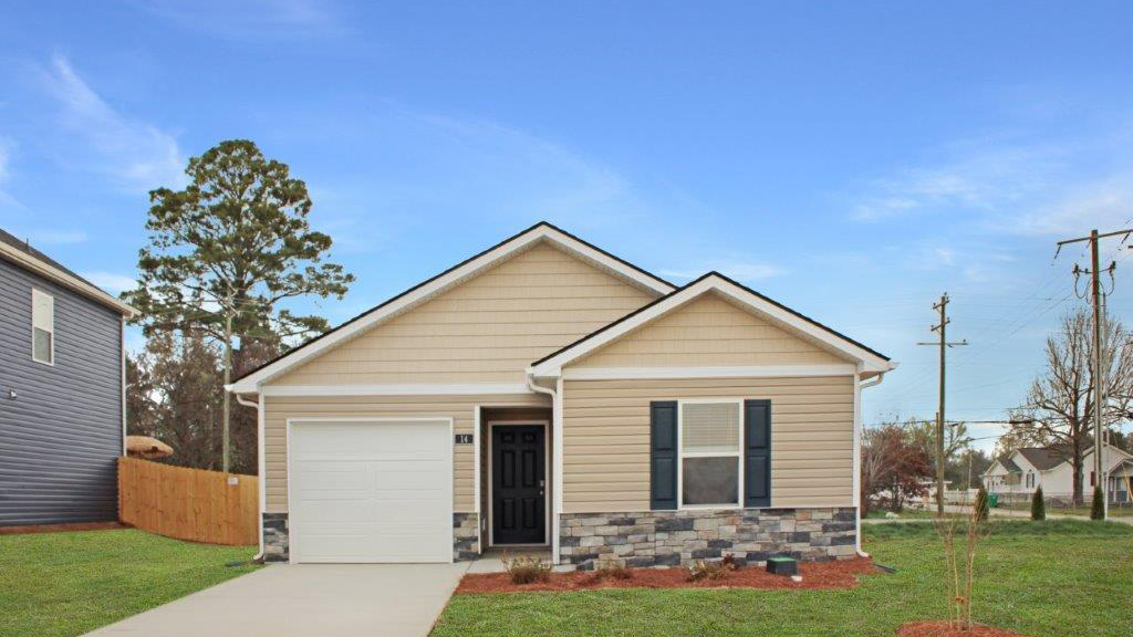 exterior of one story home with one car garage