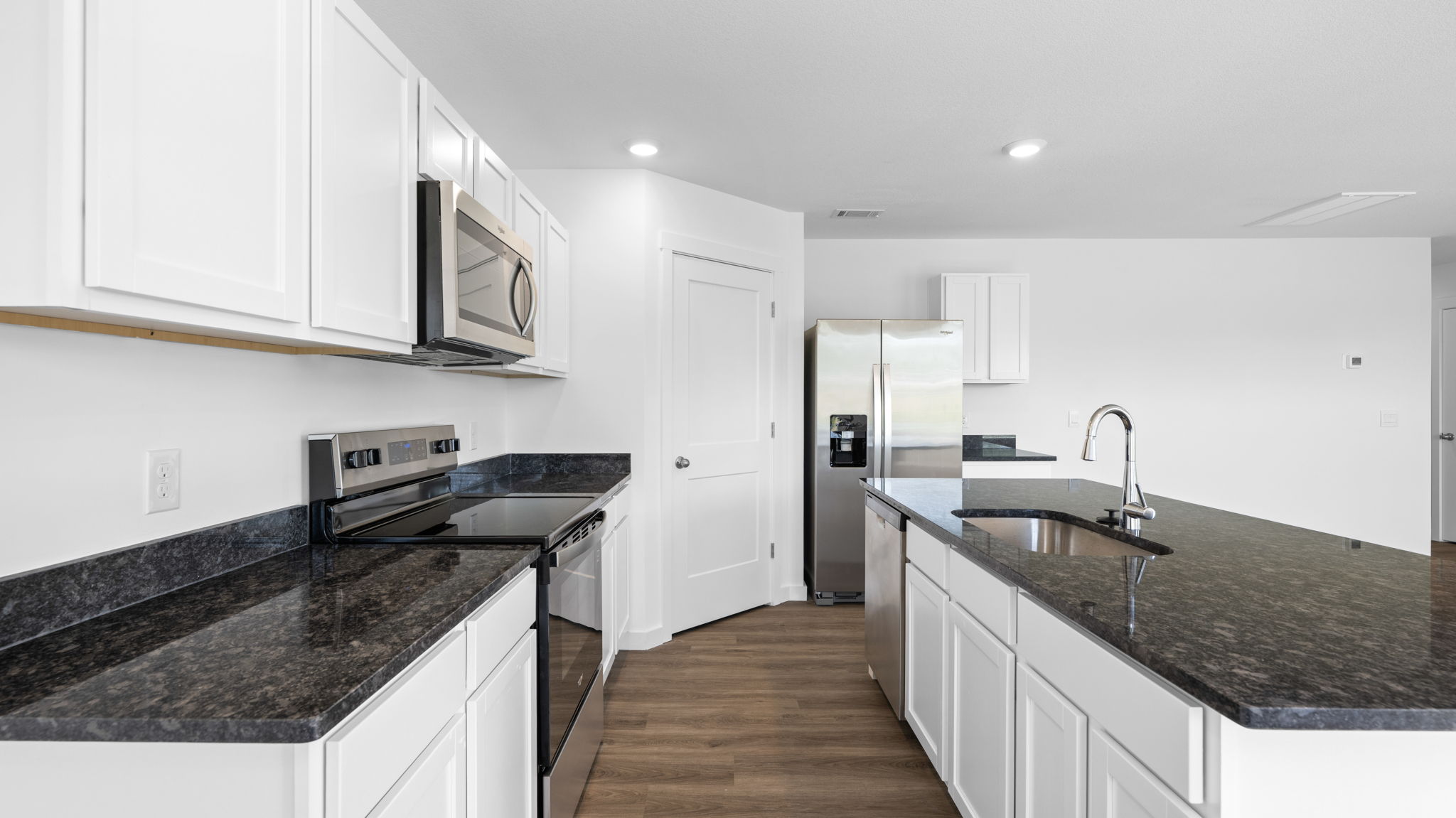 kitchen with large island and stainless steel appliances