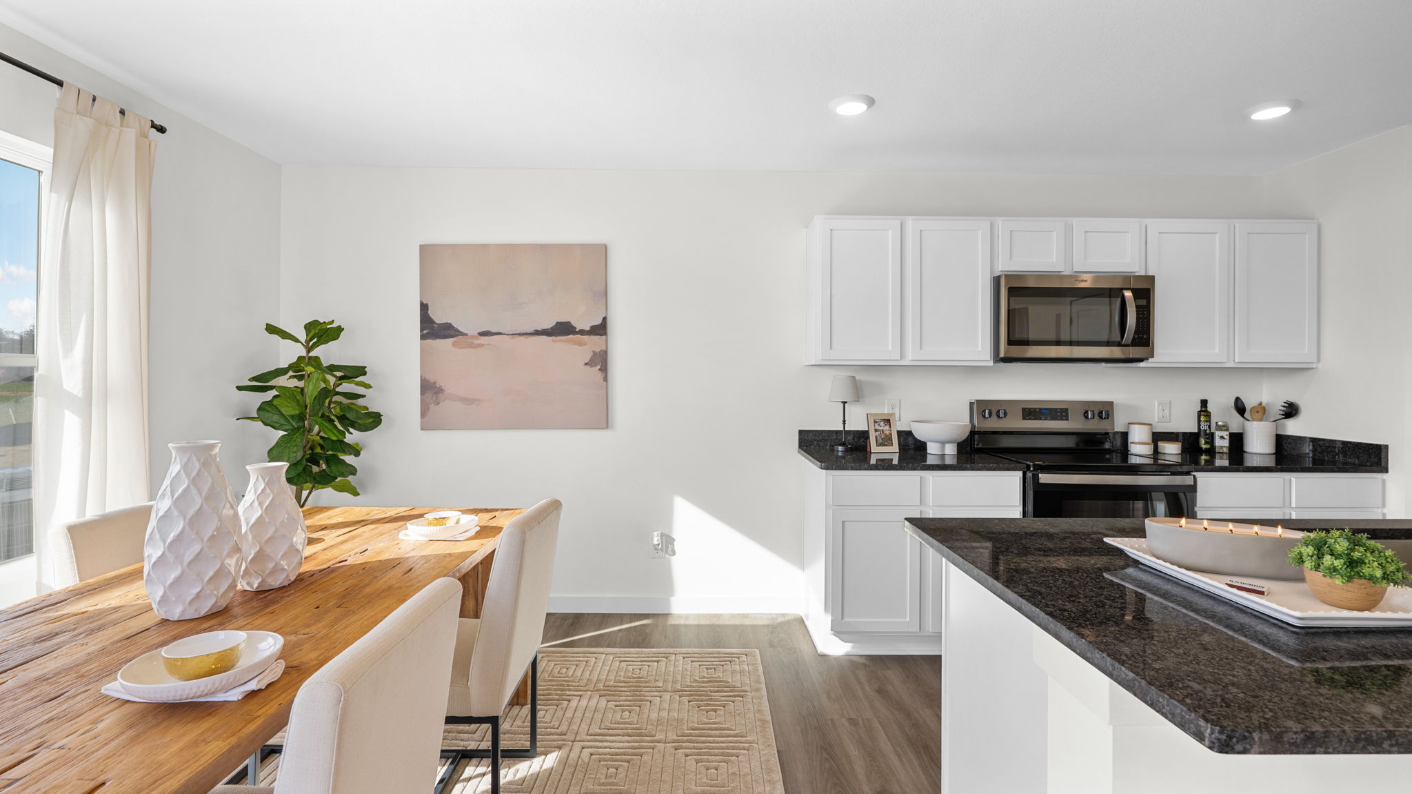 dining area with double window and back door
