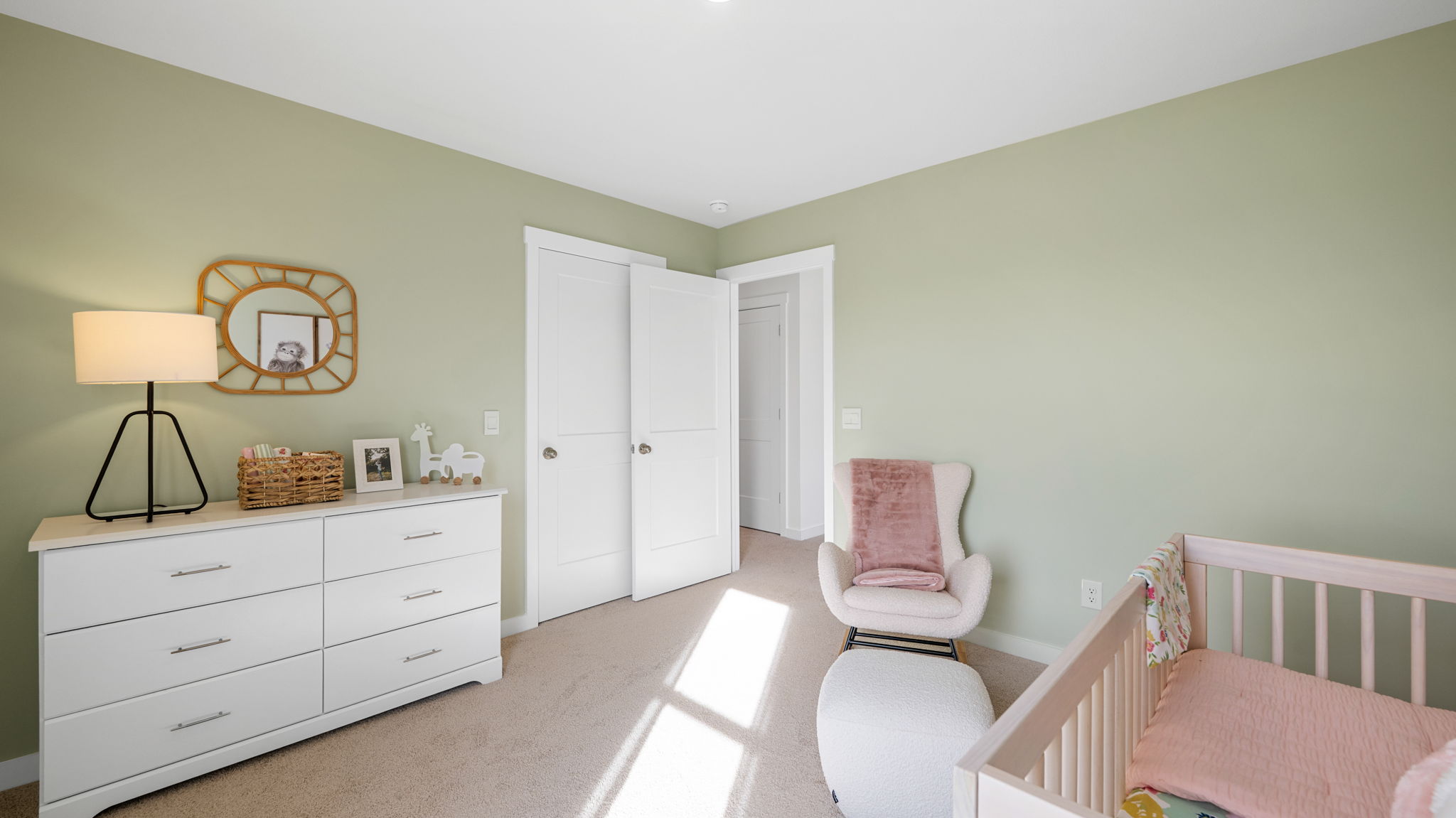 bedroom with single window and walk-in closet