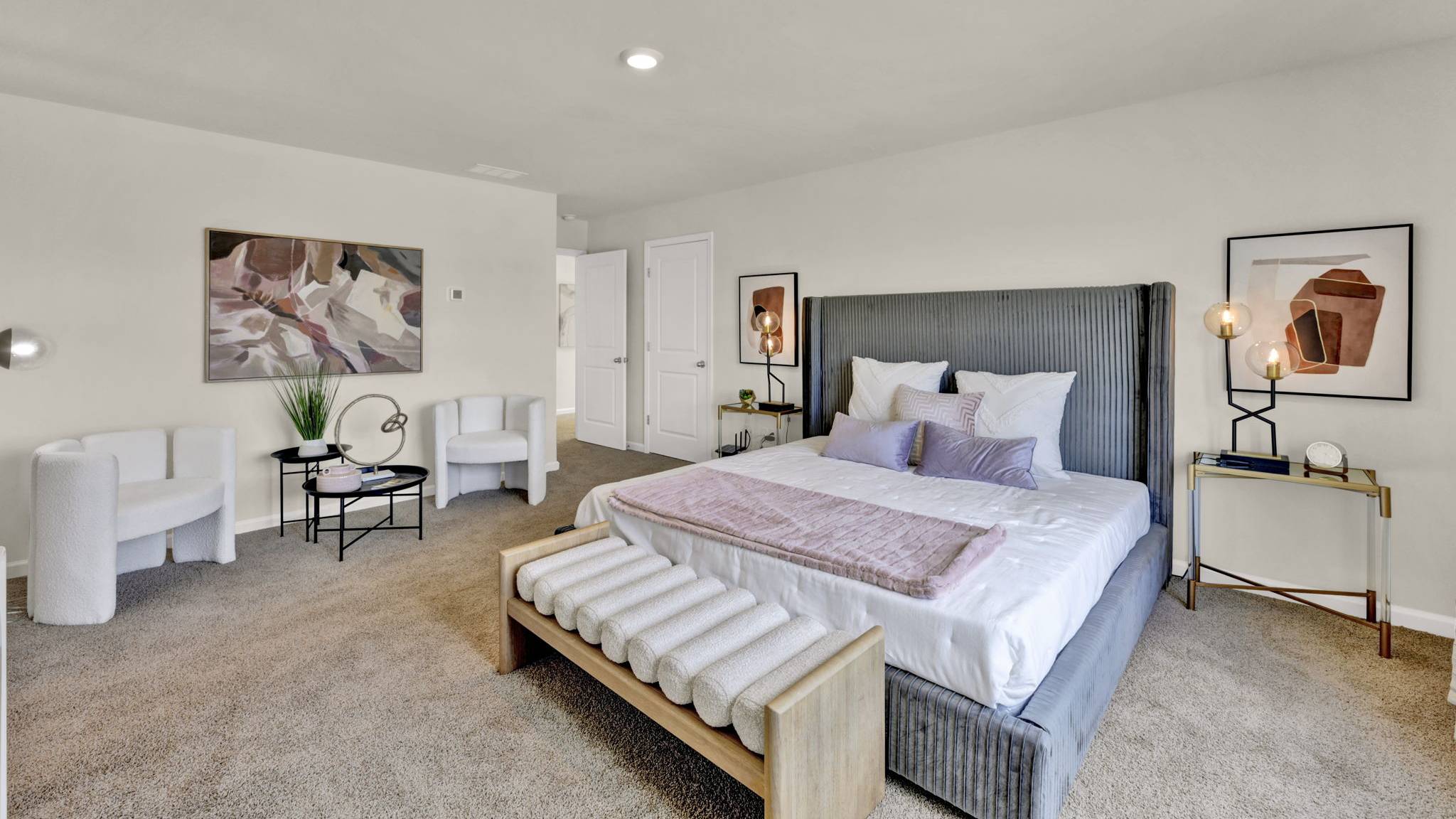 open concept primary bedroom