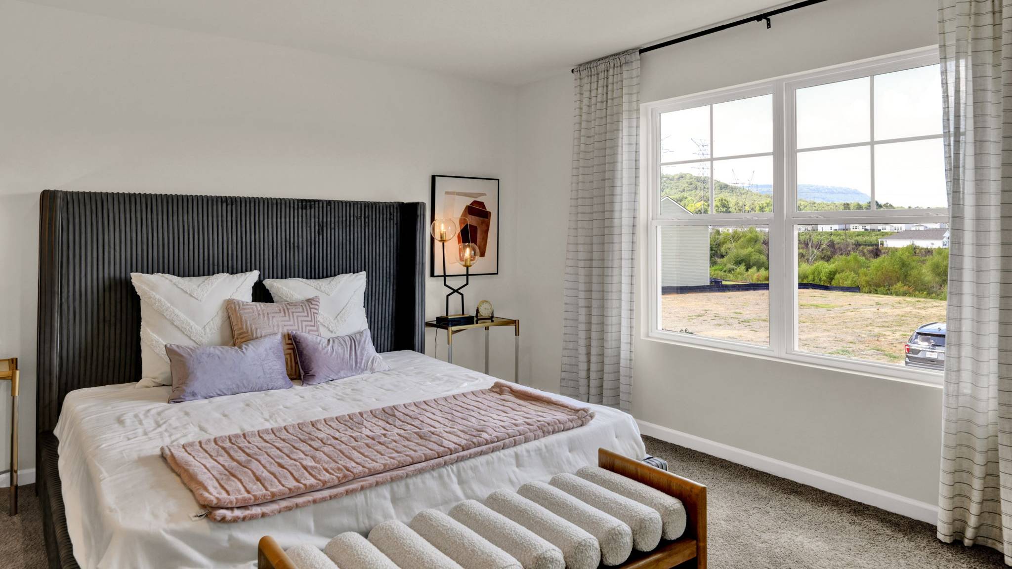 primary bedroom with double window