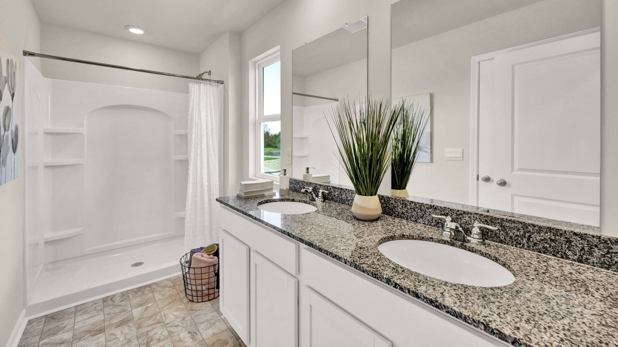 primary bathroom with shower and single window