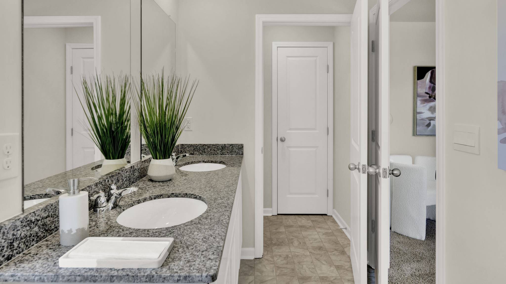 primary bathroom with double vanity