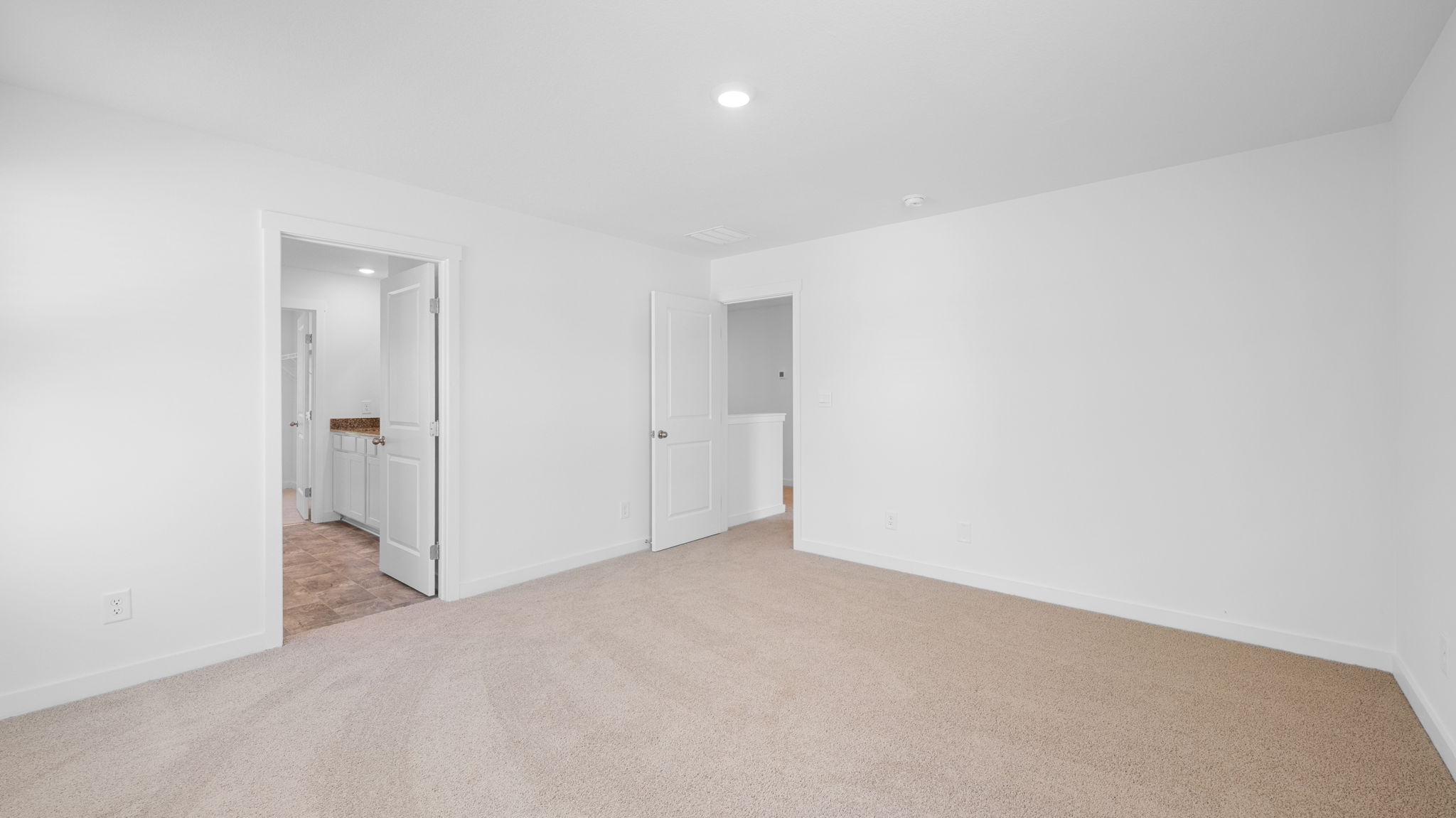 primary bedroom with en suite bathroom