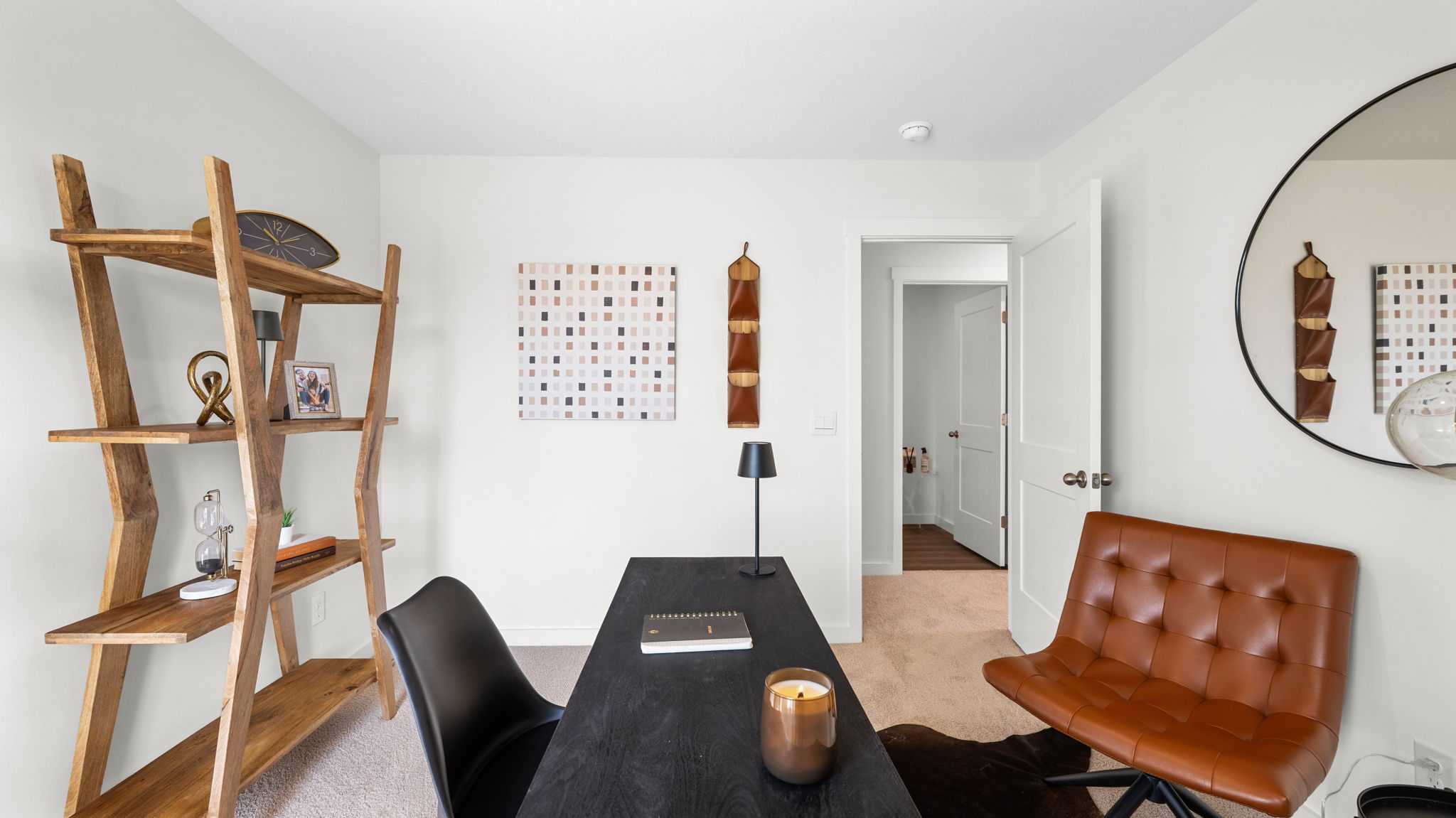 office/ bedroom space with walk-in closet