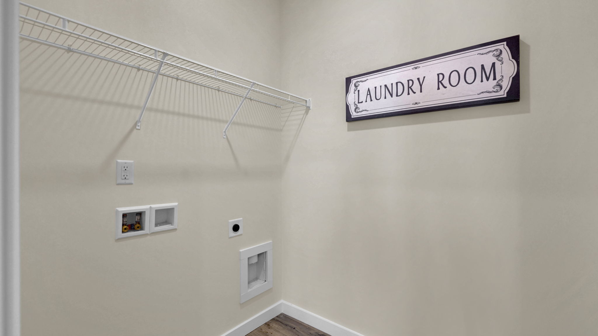 Laundry room with shelving