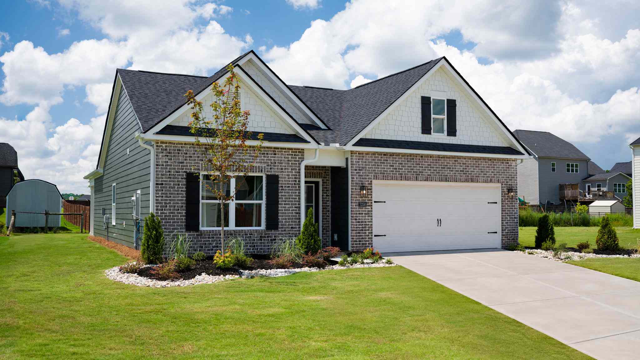 Front exterior of full brick front of home