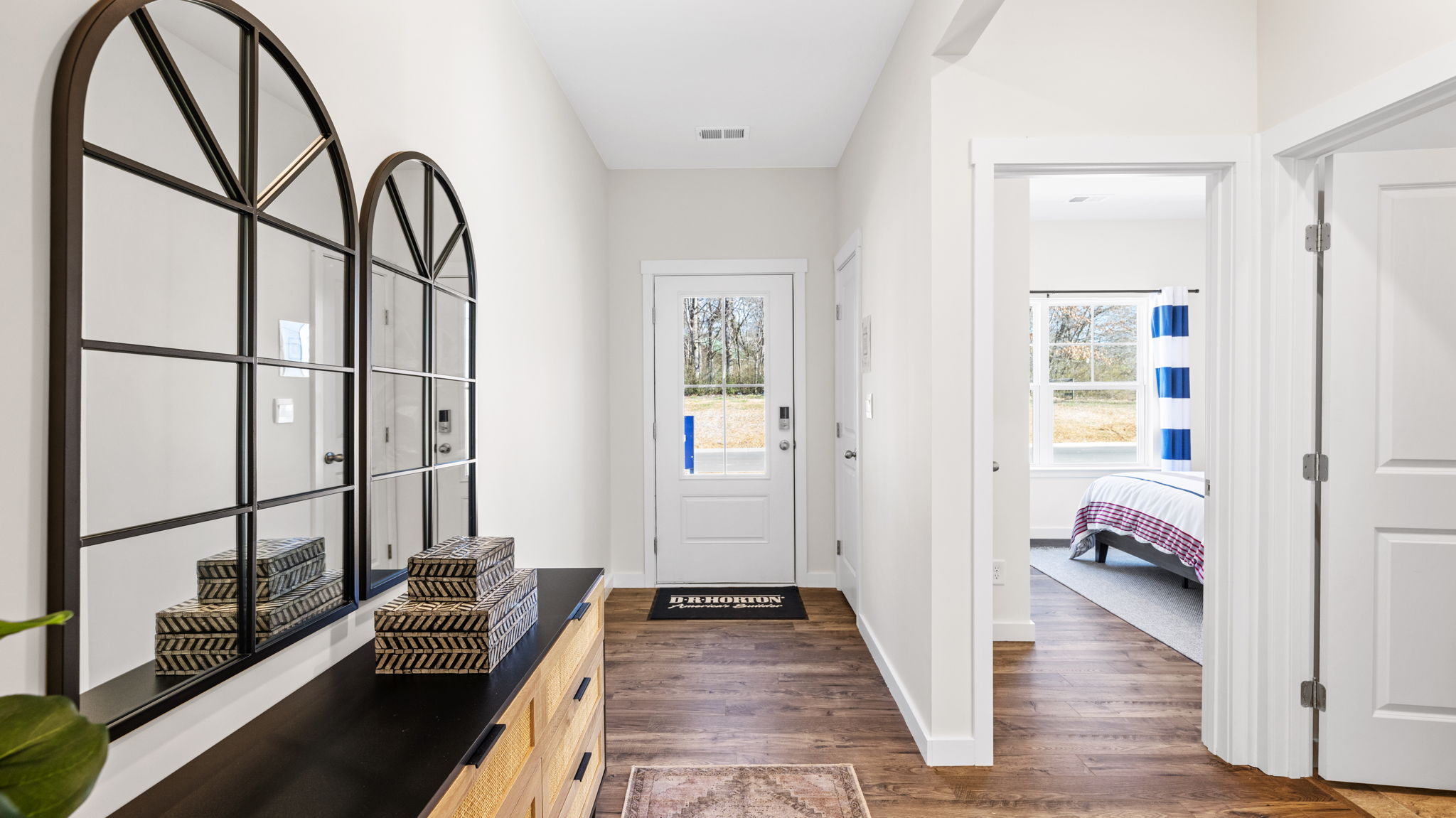 Entry way of one story home with LVP