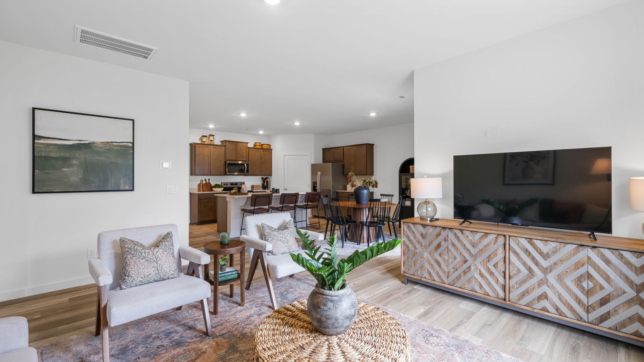 Living room with double window and LVP