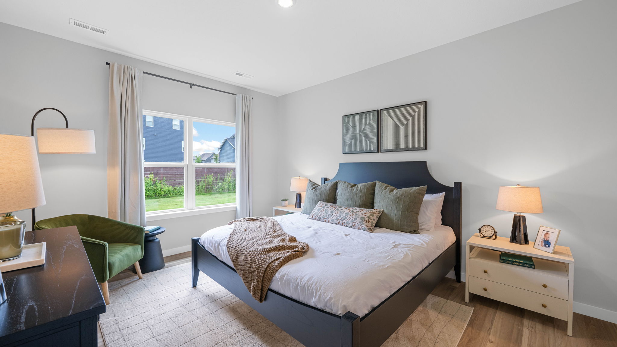 Primary bedroom with double window