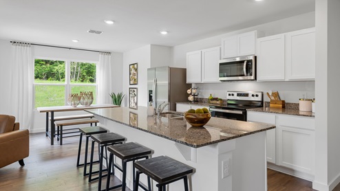 Eating area off kitchen with double window