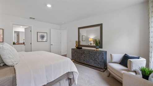Primary bedroom on first floor off kitchen