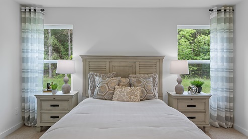 Guest bedroom with two windows