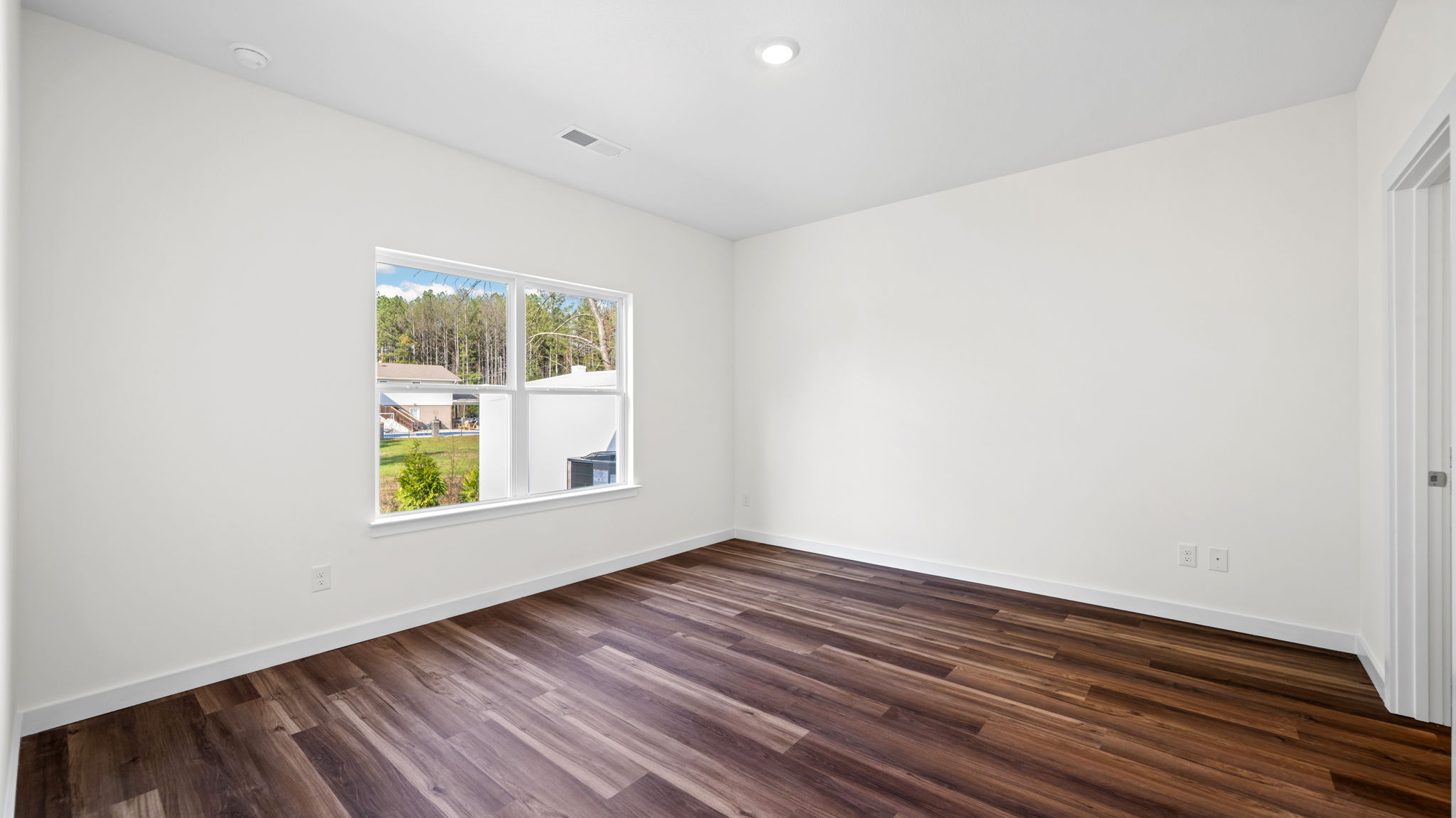 bedroom with lvp flooring