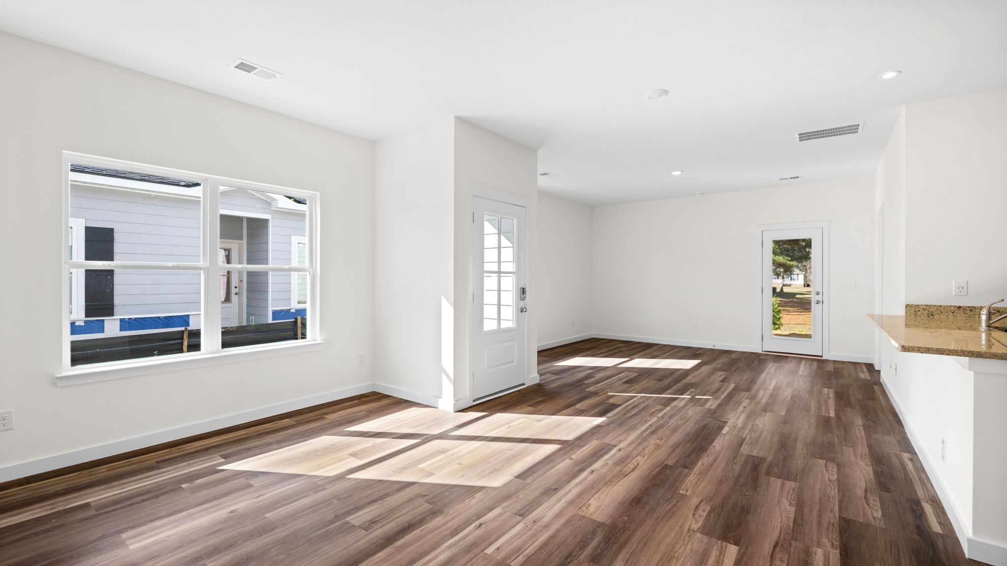 open living area with hard flooring