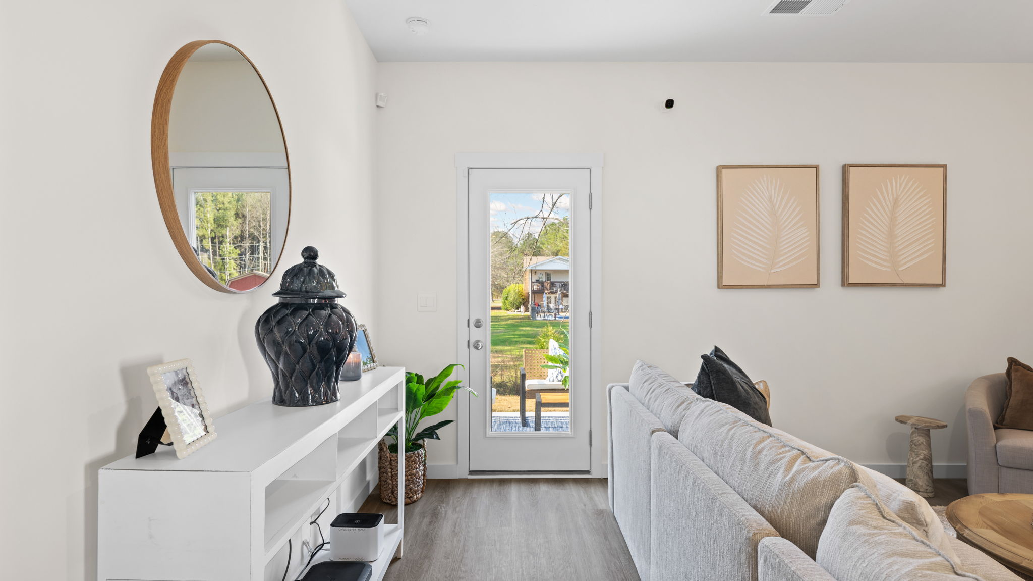 living area with couch and exterior door