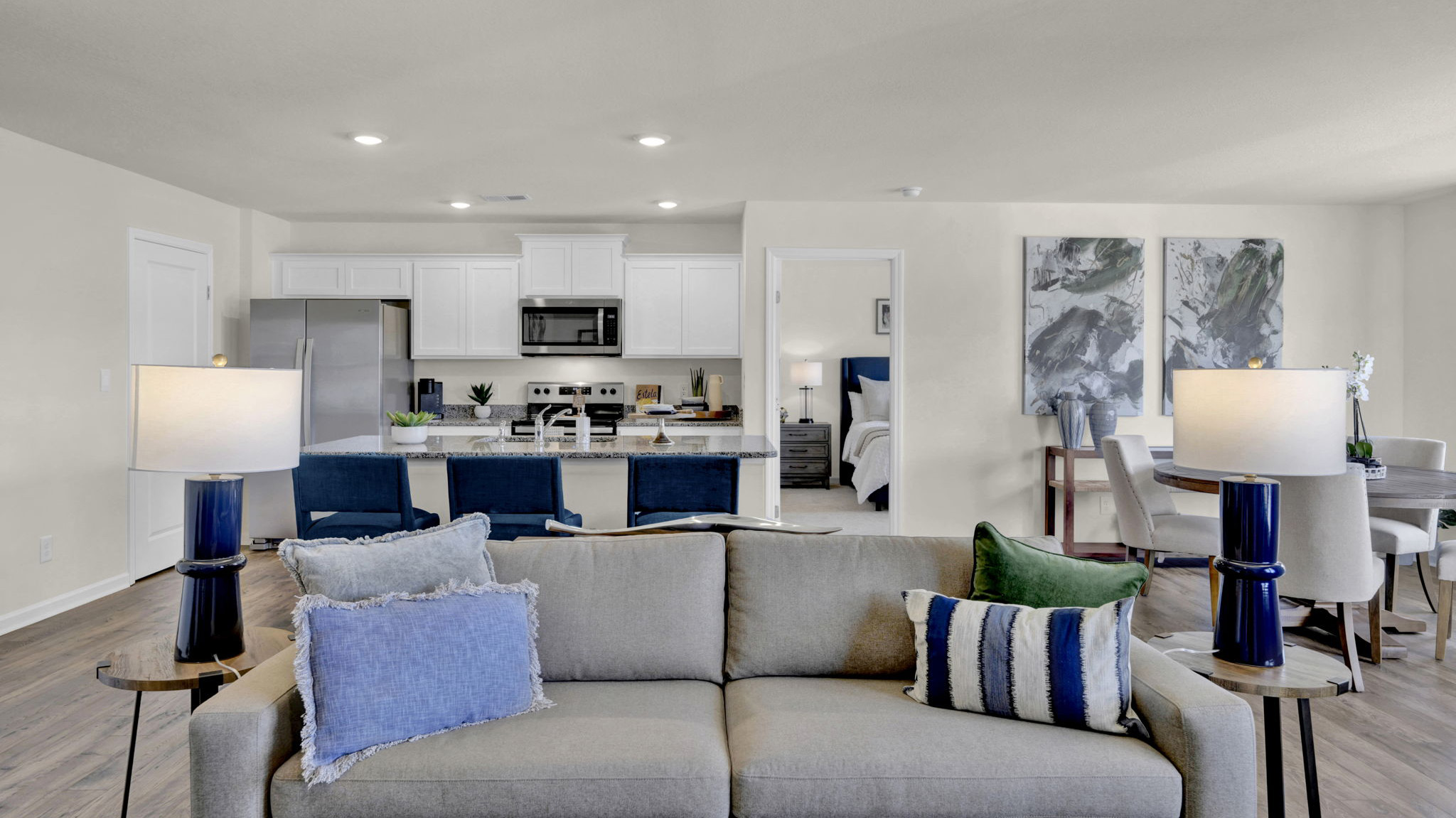 kitchen with island opens into living room
