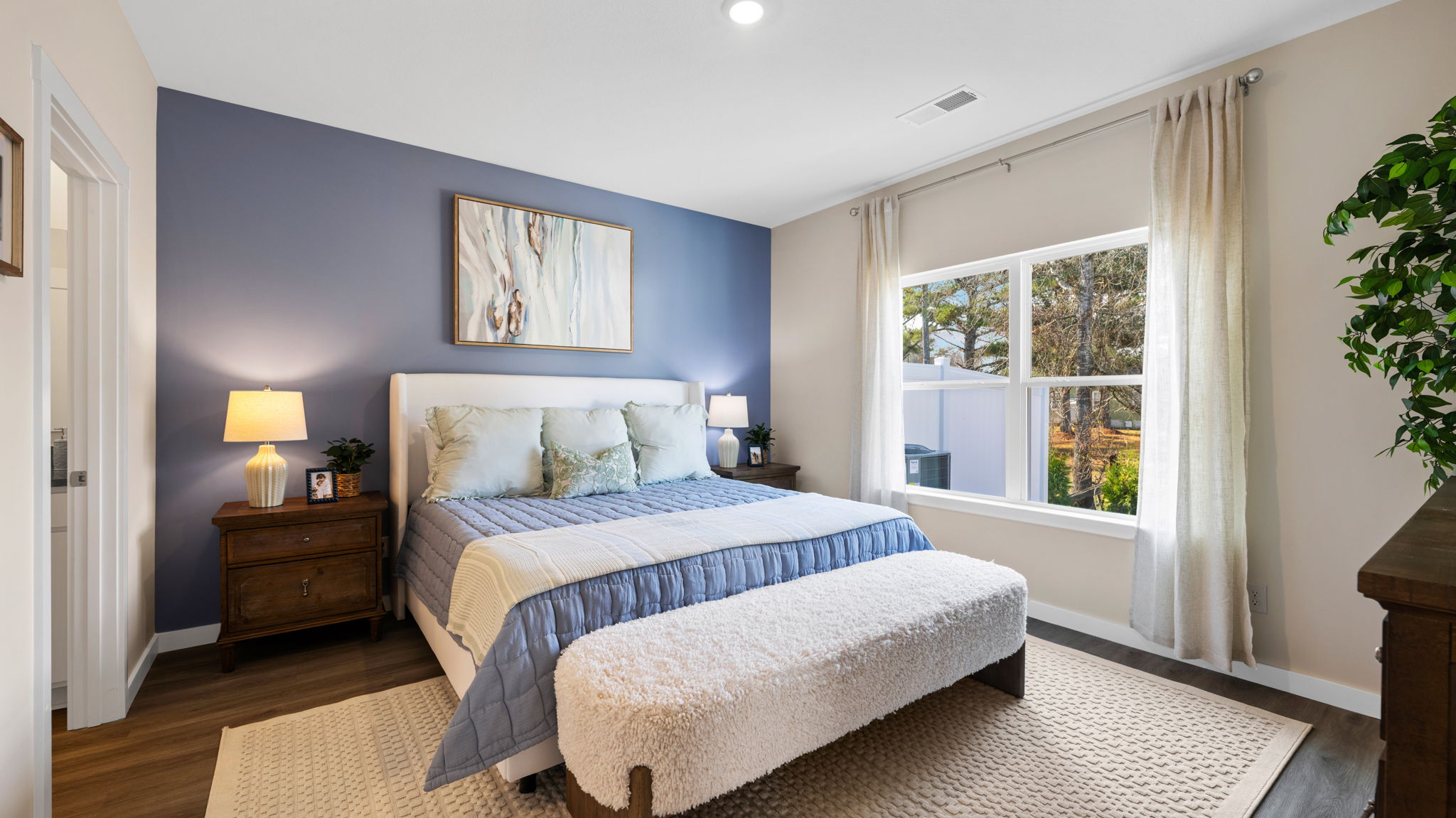 primary bedroom with double window