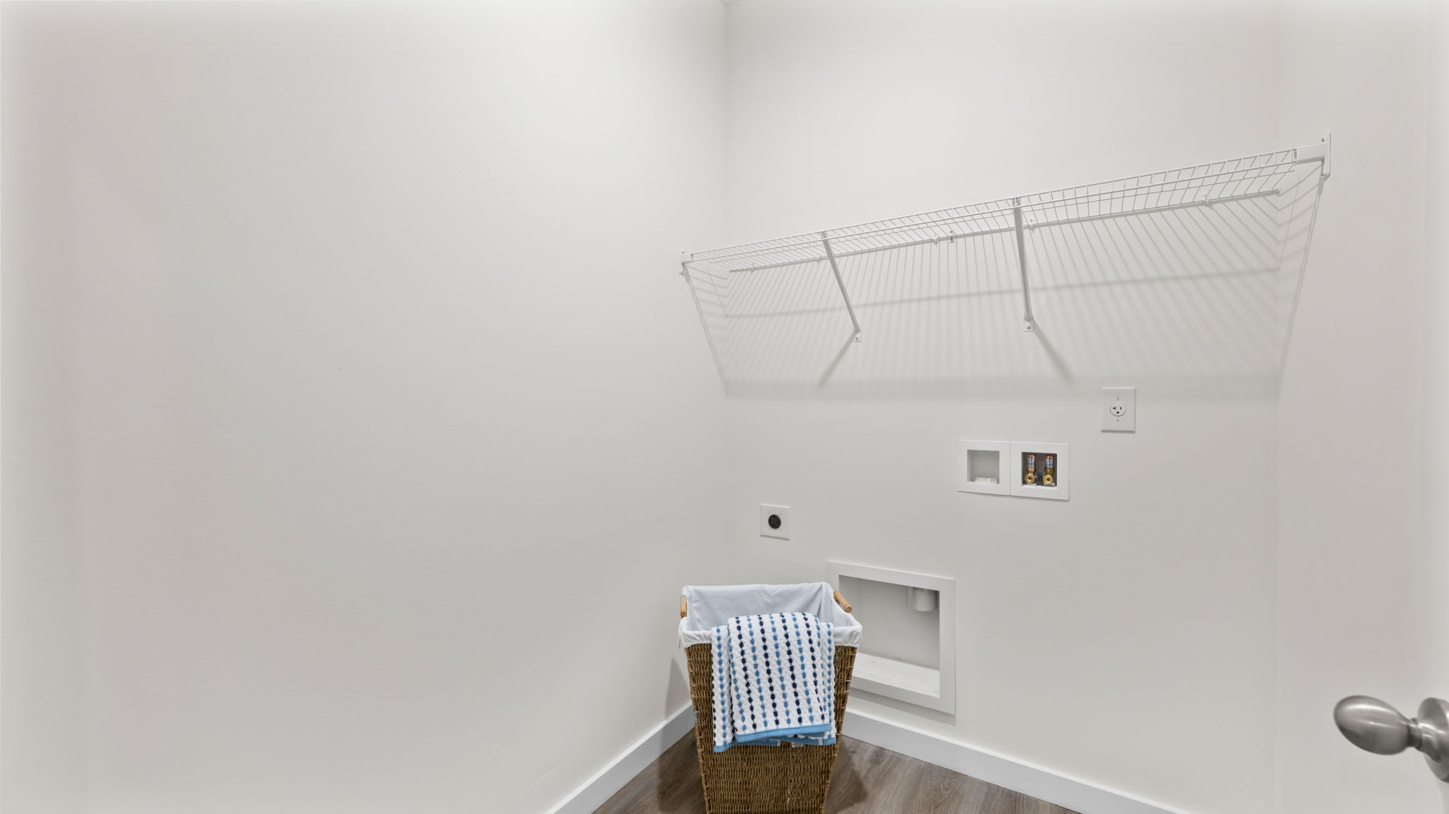 laundry room with shelf