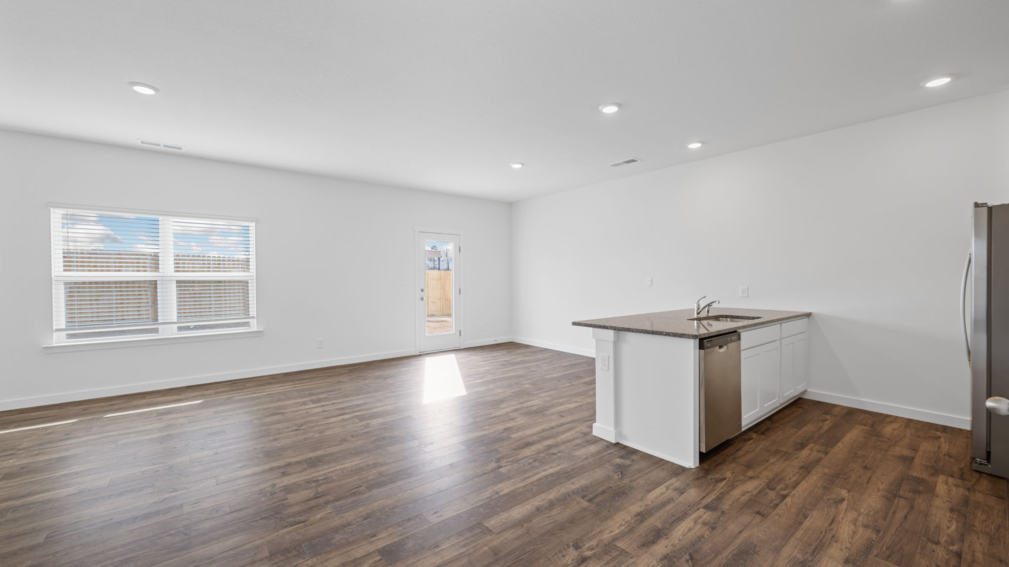 kitchen opens into living area