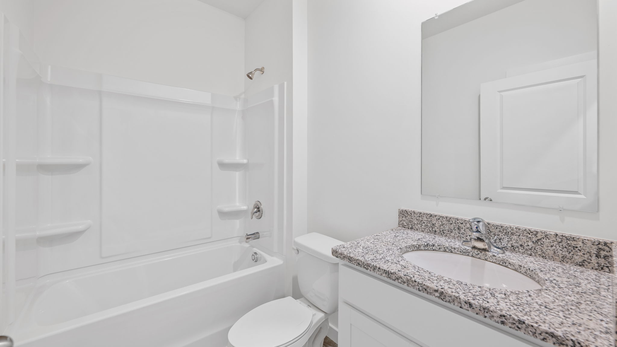 bathroom with quartz countertops