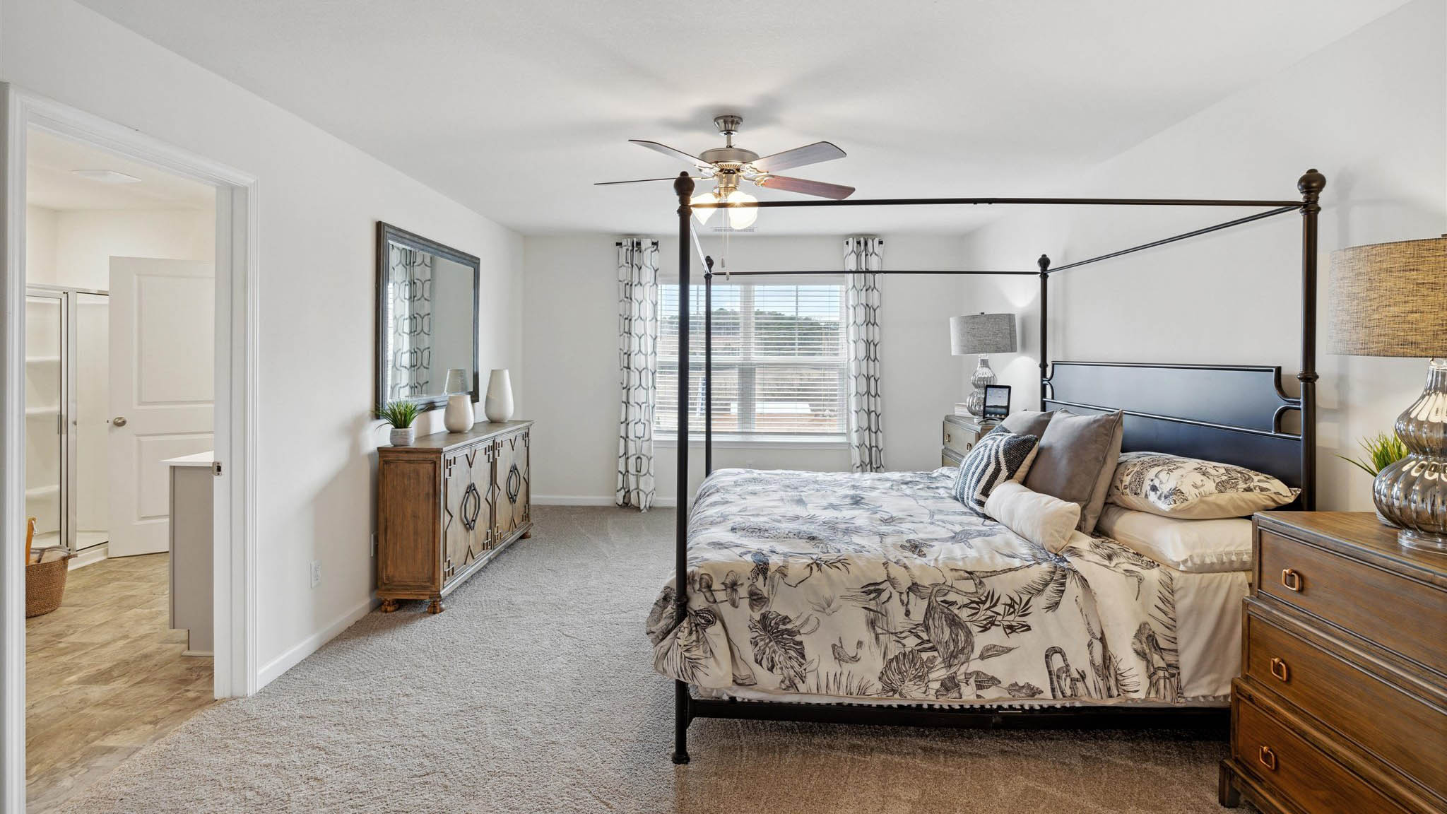 Primary bedroom with carpet