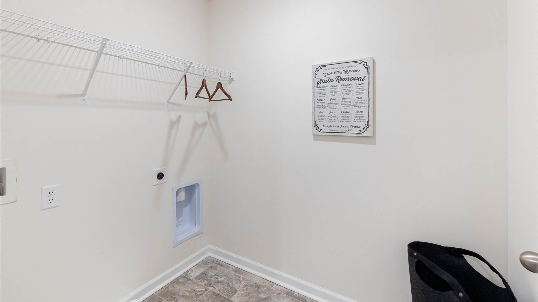 Laundry room with shelving