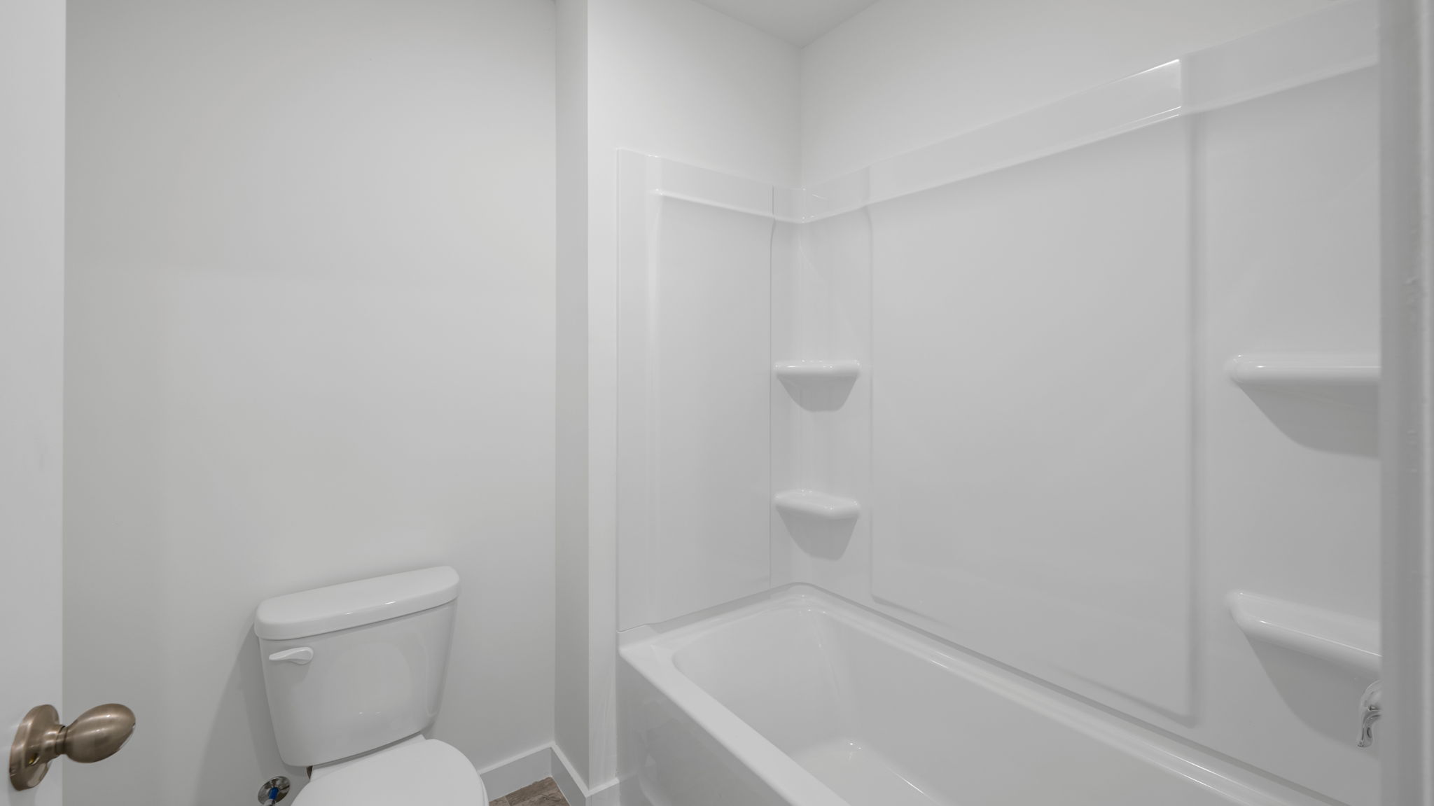 bathroom with tub and shower combination