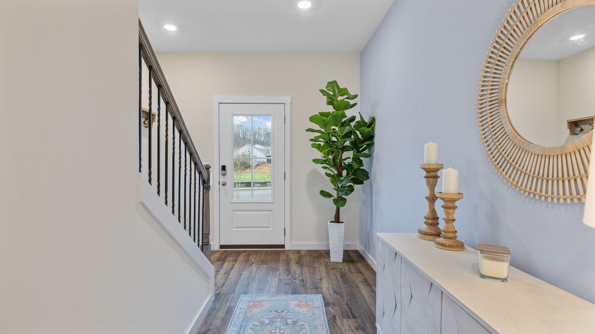 the foyer leads to the stairs