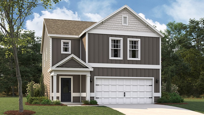 Two story home with board and batten siding and two car garage