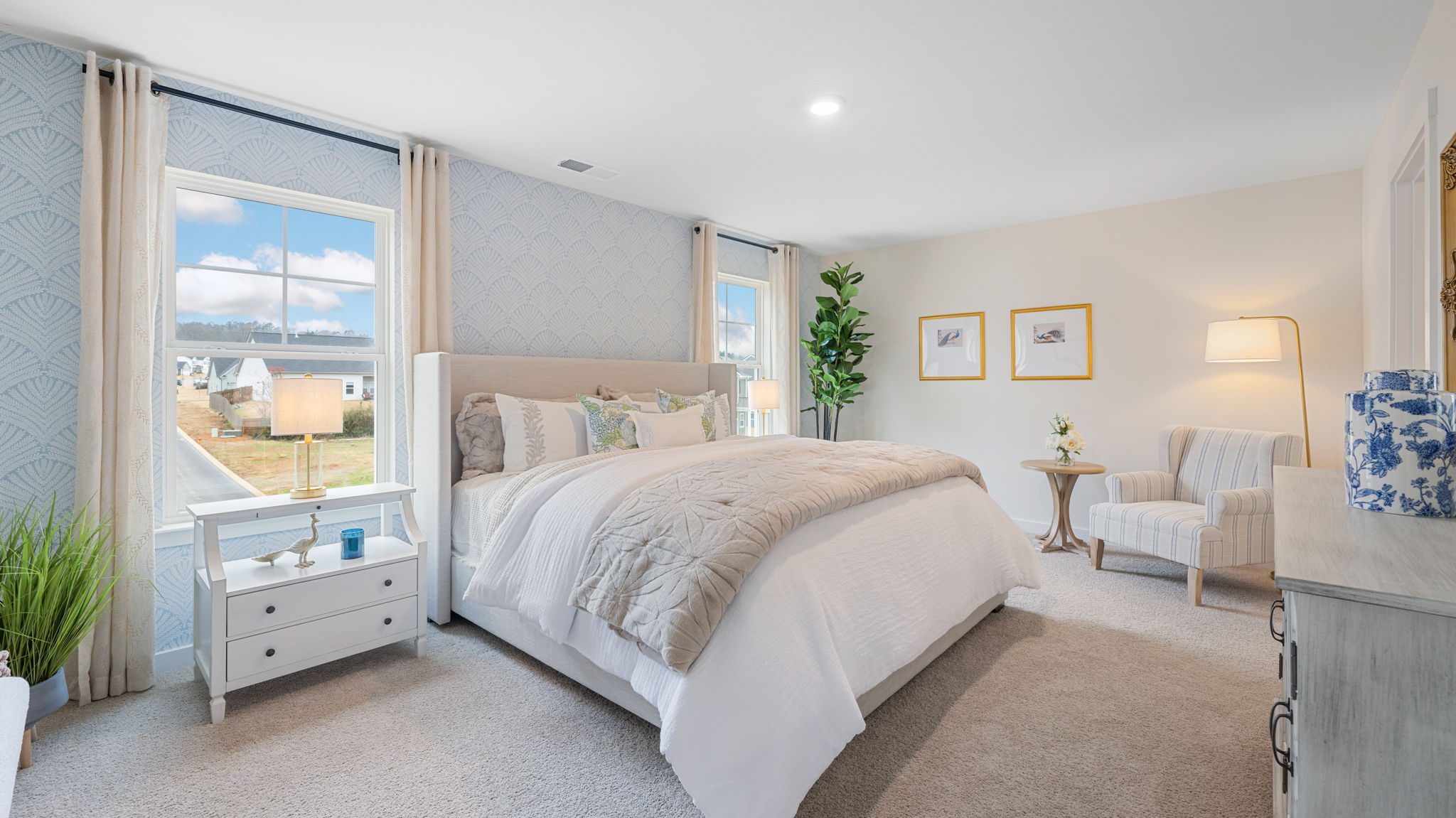 Primary bedroom with carpet