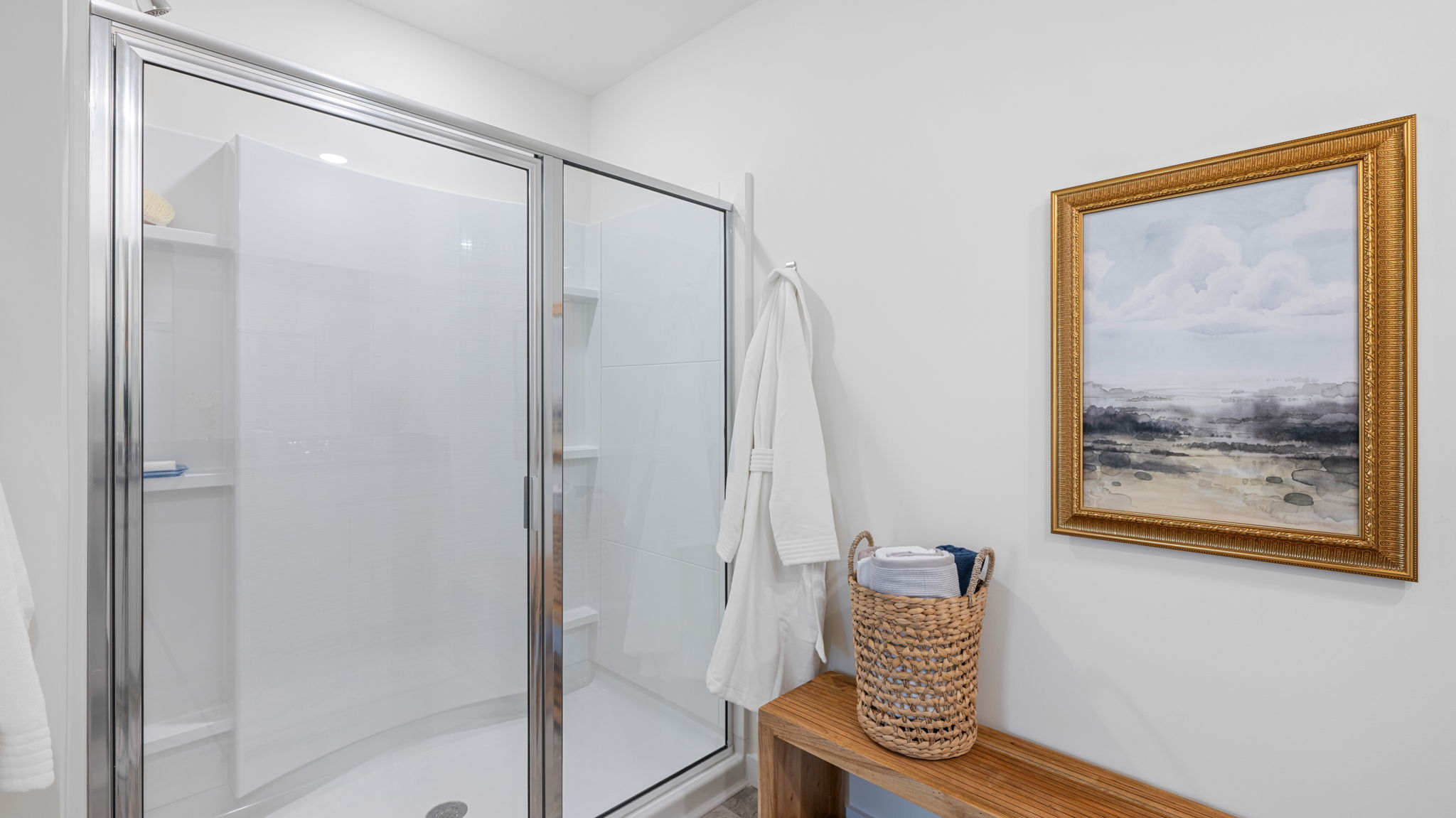 Primary bathroom with glass shower door