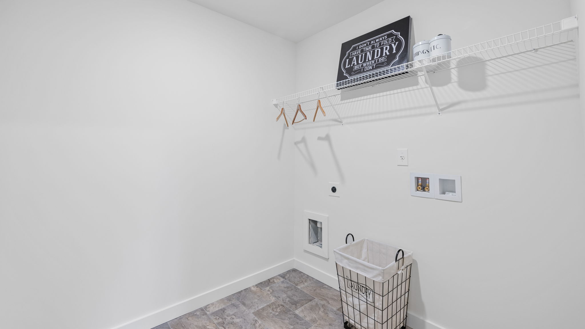 Laundry room with shelving