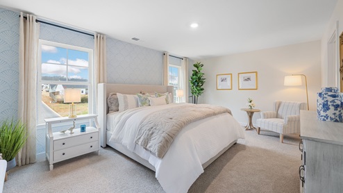 Primary bedroom with two windows
