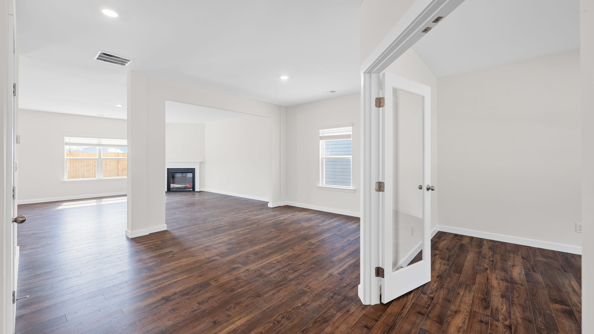 open concept enrtryway with office to the right