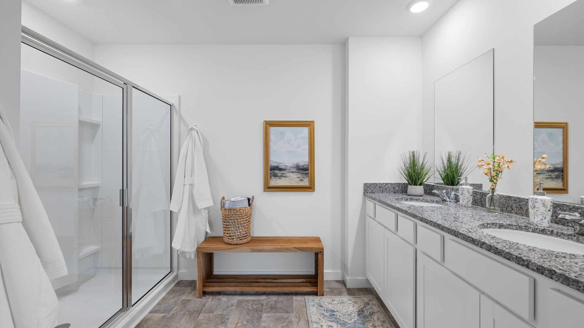 the bathroom has a standup shower