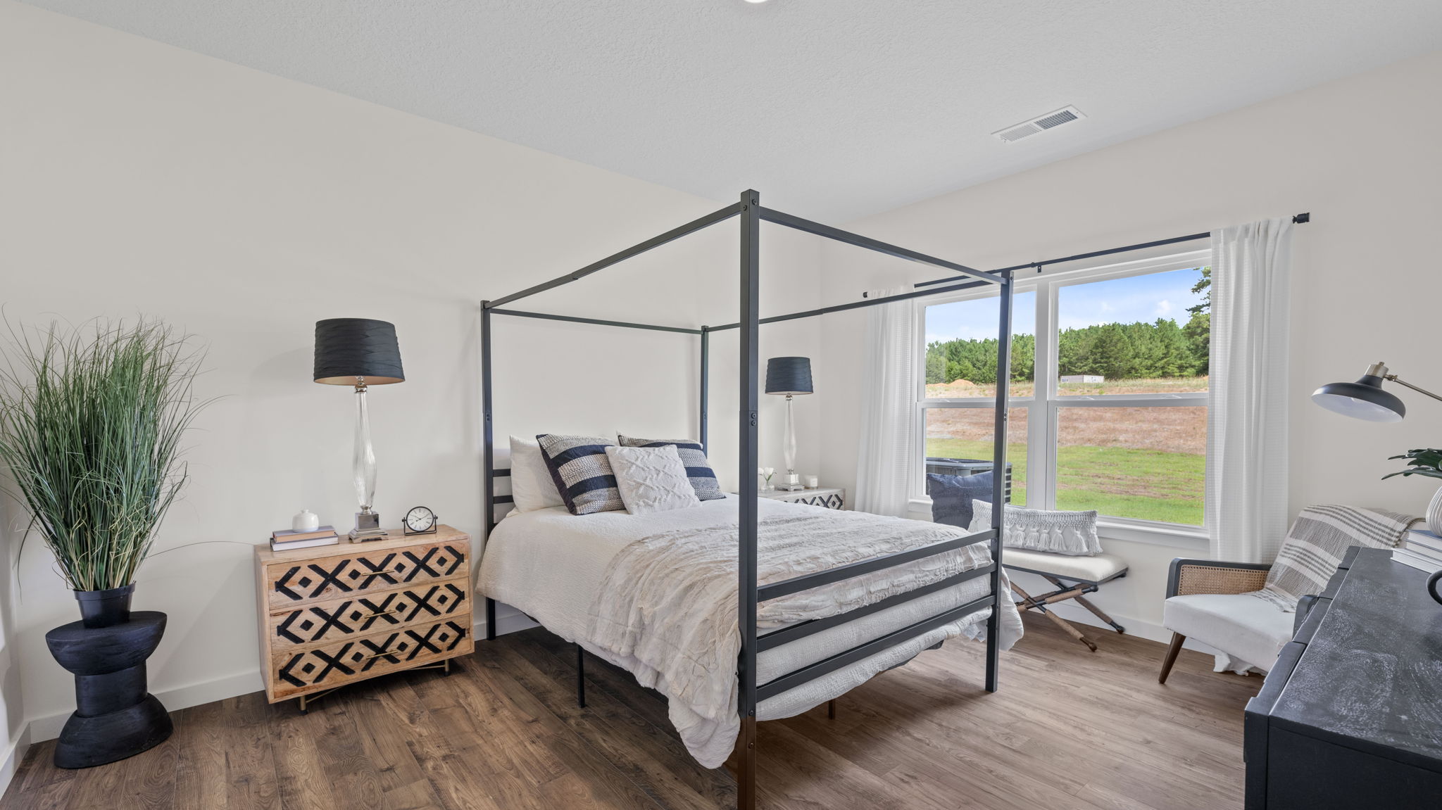 primary bedroom with double window