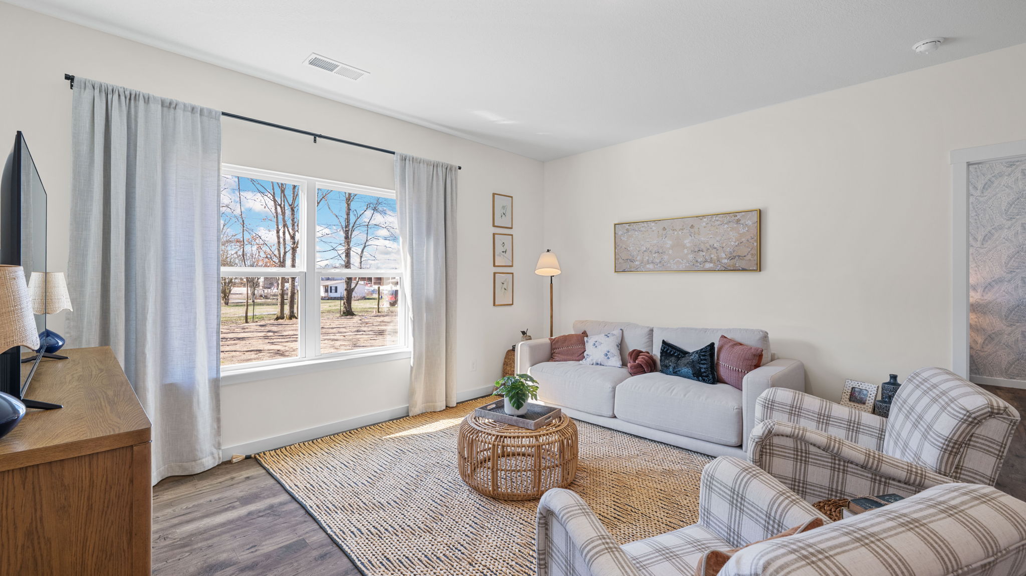 open concept living room with double window