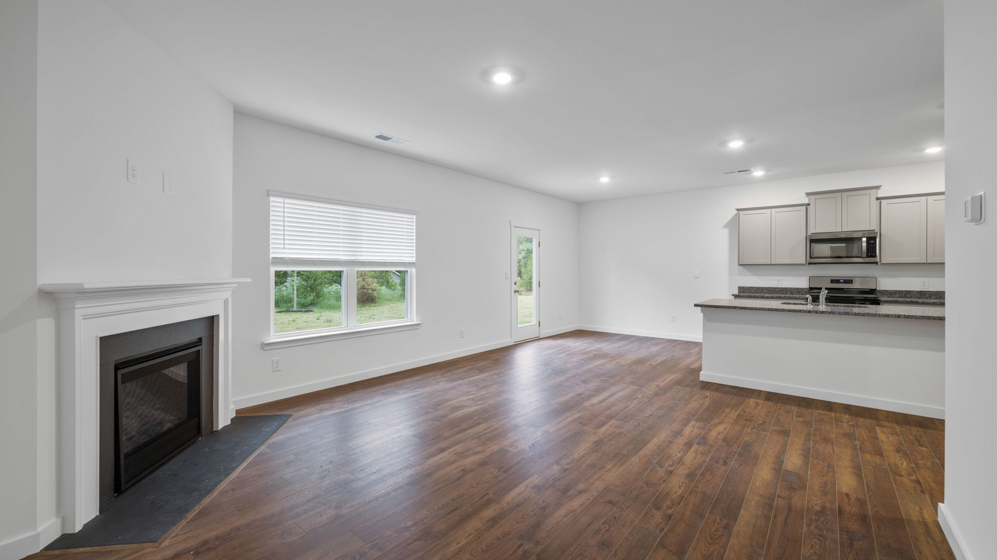 open concept living room double window